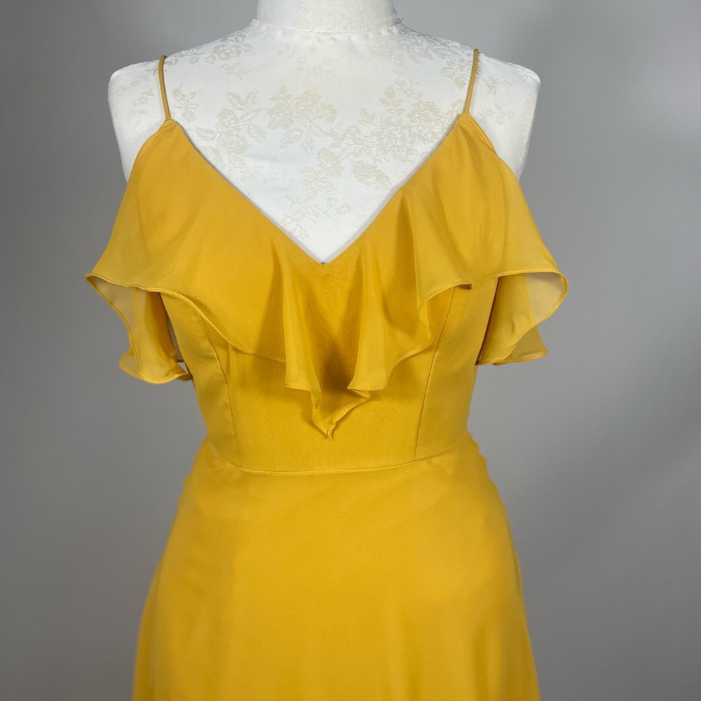 Used long dress yellow with front slid. Good condition.